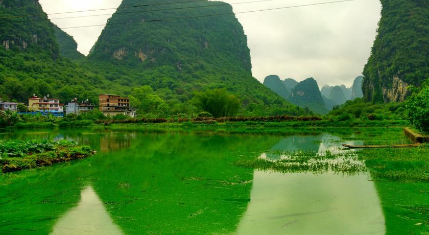 Yangshuo Peaceful Valley Retreat Hotel Bagian luar foto